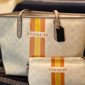 Coach shoulder bag with orange varsity stripe